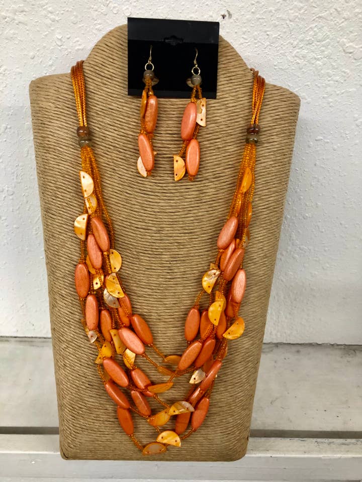 4 STRANDS ORANGE WAX CORD WITH ORANGE SEED BEADS WITH WOOD A for wholesale by International Duru's