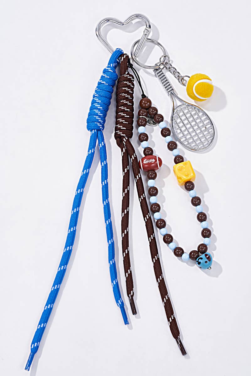 Blue Grigri bag accessories and Tennis keychain PC48 for wholesale on Faire