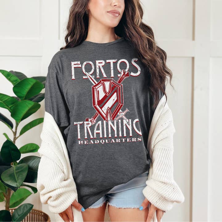 Parchment & Parcel - Wholesale Screen printed t-shirt – Women′s - Fortos Training Headquarters T-Shirt | Kindred's Curse Saga3
