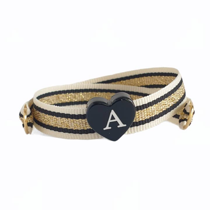 BRAZALETE LAME' CREMA CORAZÓN NEGRO INICIAL BLANCA para venta al por mayor de Smartever Srl