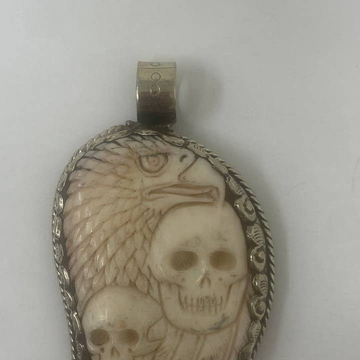 Bone Carved Eagle and Skull Pendant for wholesale by Kathmandu Jewelry
