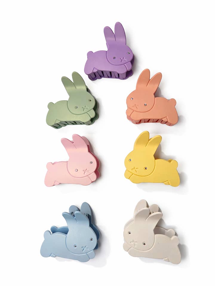 Quelqu'un t'aime Pinces à cheveux lapin pour la vente par The Bling Barn