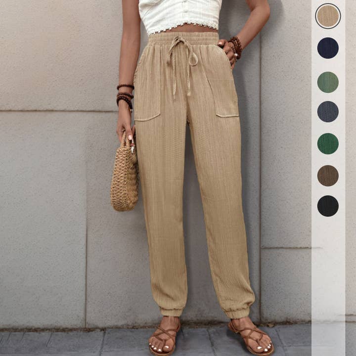 Avslappnade, texturerade joggerbyxor med knytband i midjan för wholesale av onatorobi