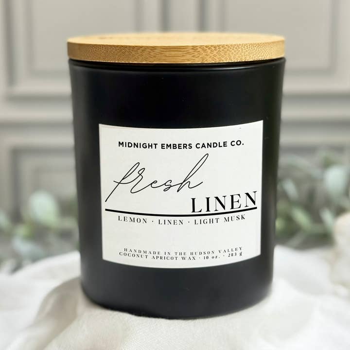 Fresh Linen | 10 oz. Matte Black Glass Hand Poured Candle for wholesale by Midnight Embers Candle Co.