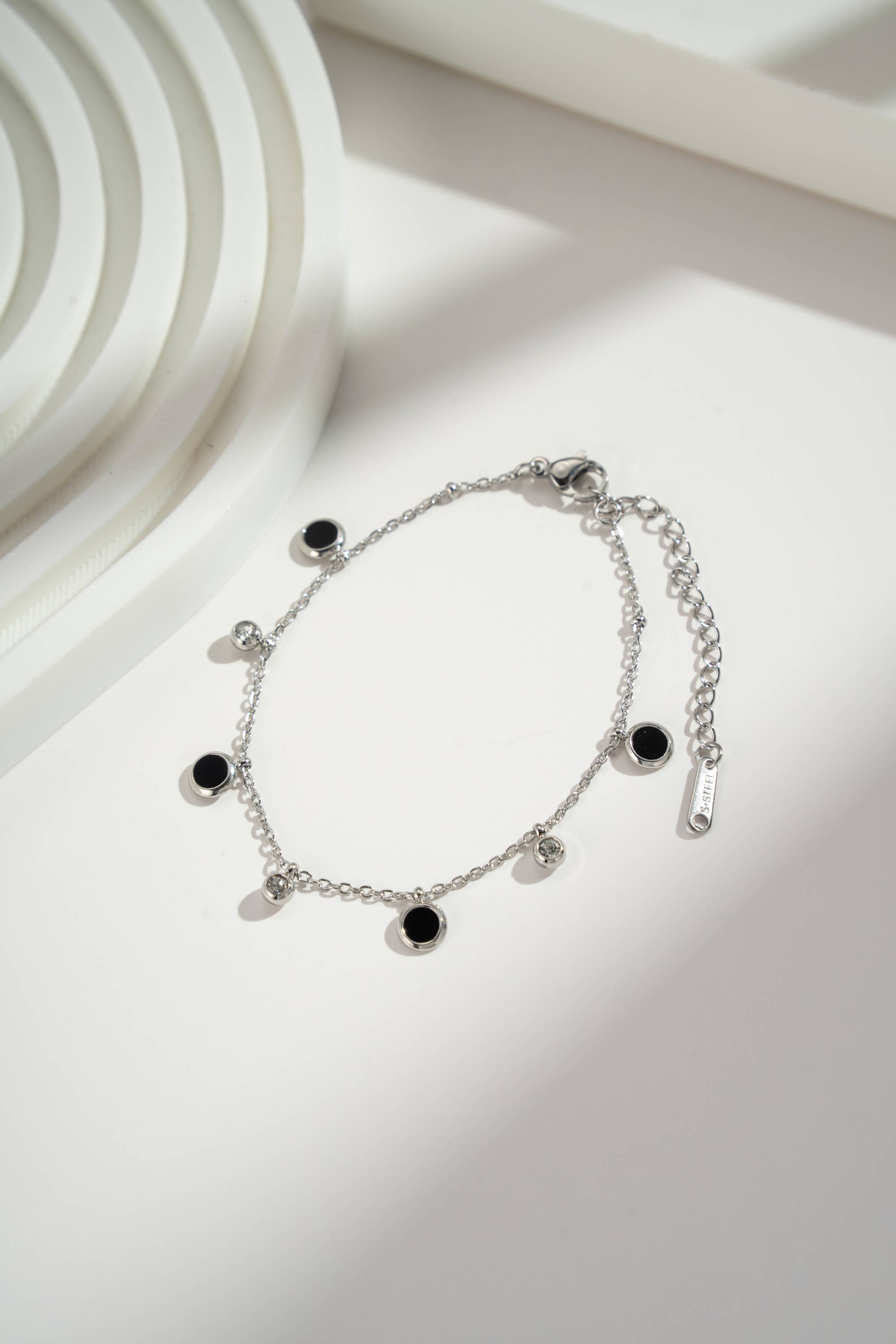 COSMOS – wholesale Charm/dangle bracelet – Black and gold charm bracelet in stainless steel2