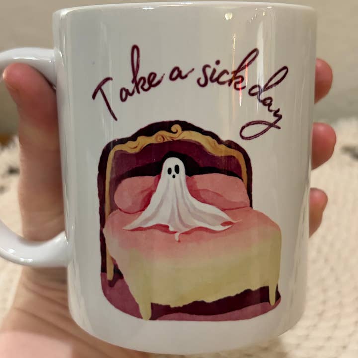 Funny Ghost “Take a Sick Day” Cutesy Goth 110z Ceramic Mug for wholesale by Cryptic Paper Co.