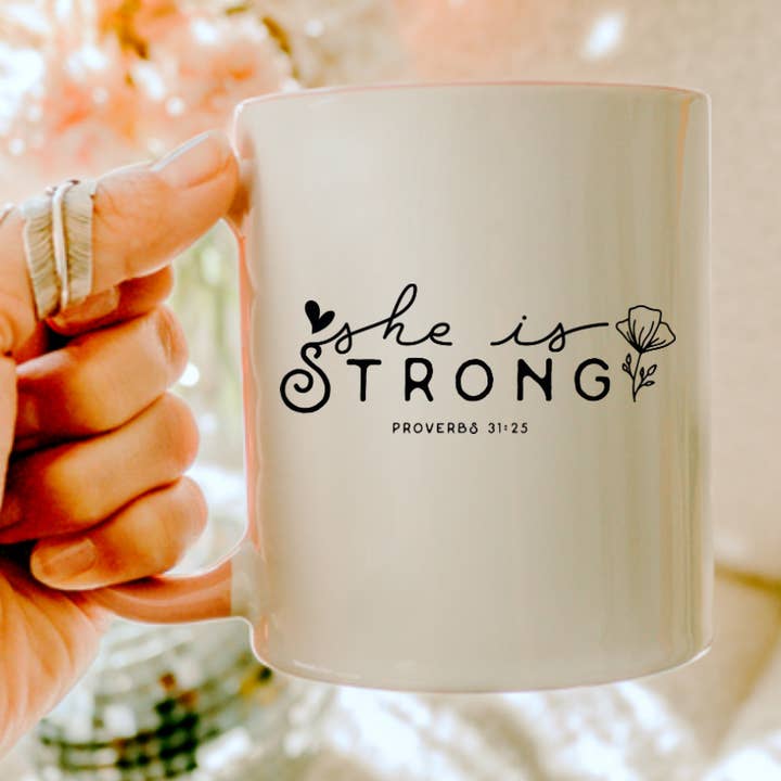 Inspirational Christian Coffee Mug, She Is Strong Coffee Mug for wholesale by Posh Magnolia Boutique