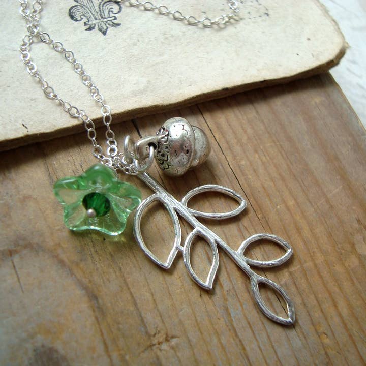 Silver Leaves Necklace With Green Blossom and Acorn for wholesale by Fuchsia Bloom Studio