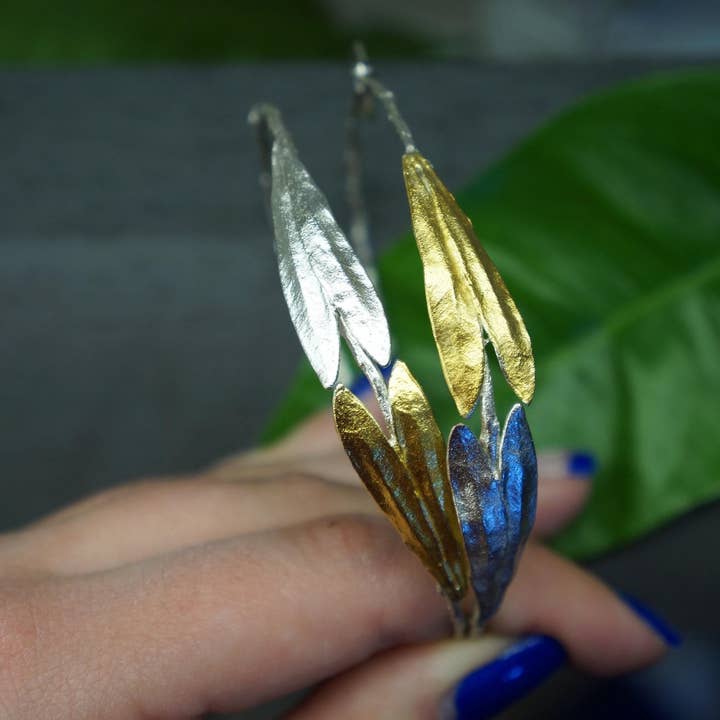 Olive Branch Hoop Earrings: Large Sterling Silver With Gold Leaves for wholesale by Mother Nature Jewelry