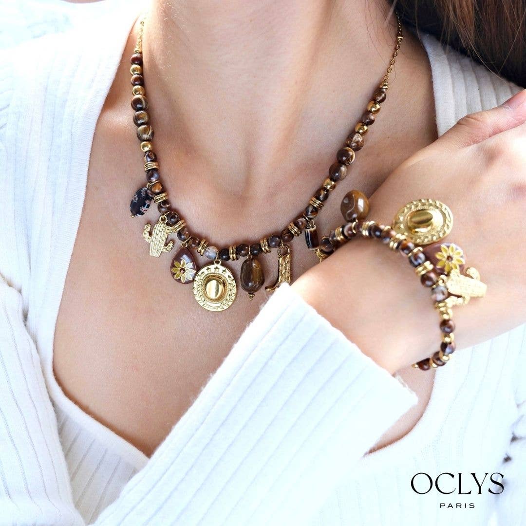 Oclys - Wholesale Pendant/Charm Necklace - Resin pearl necklace with cowboy charms in gold stainless steel2