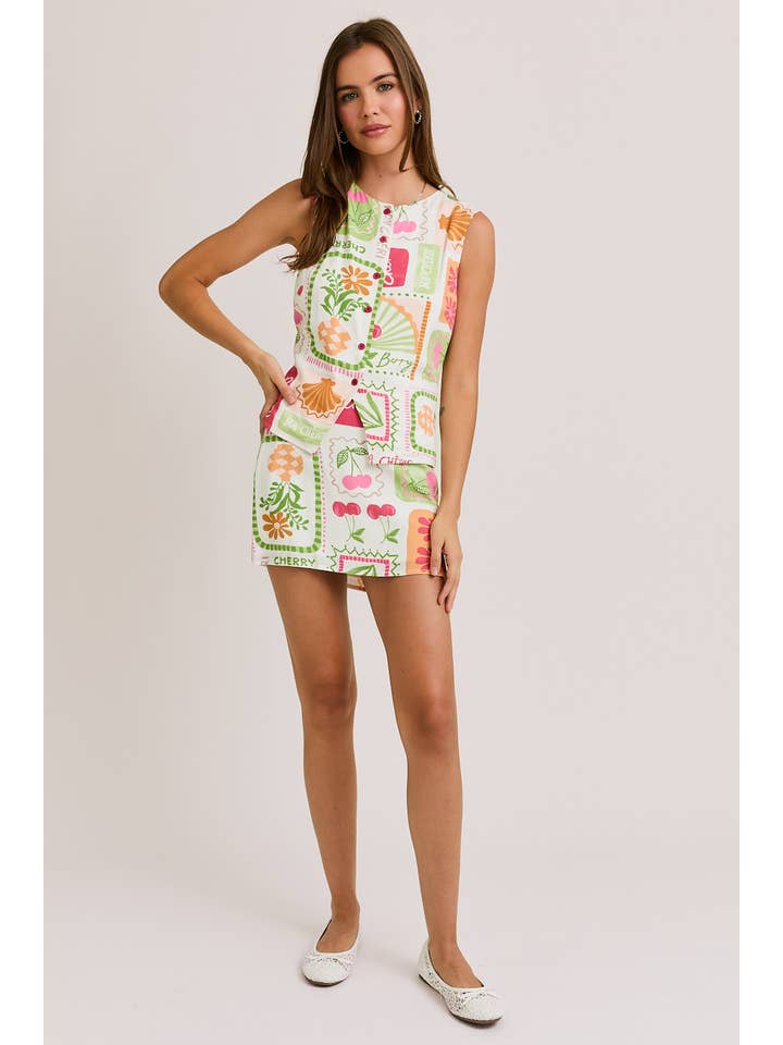 WHITE MULTI BUTTON DOWN SLEEVELESS TOP WITH SLIT MINI SKIRT for wholesale on Faire