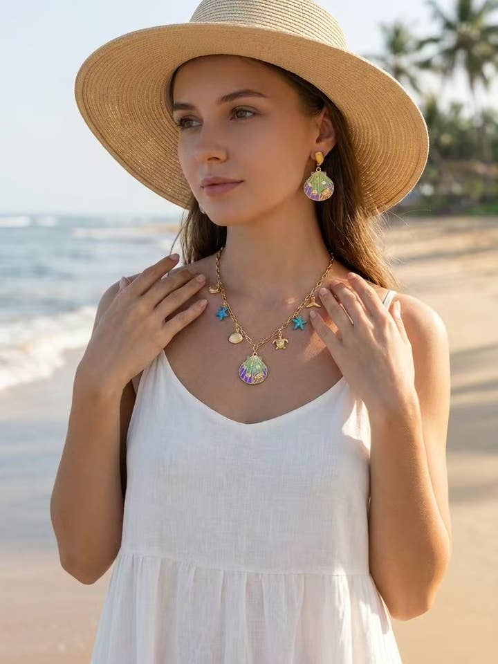 Halskette mit Muschel-Anhänger und Charms aus Edelstahl für den Großhandel von COSMOS