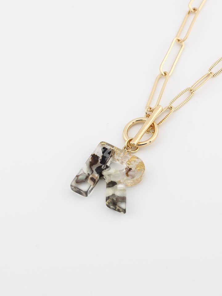 KN8166 Assorted 16 Piece Black Acrylic Initial Toggle Chain Necklace Pack for wholesale by MiMi Wholesale