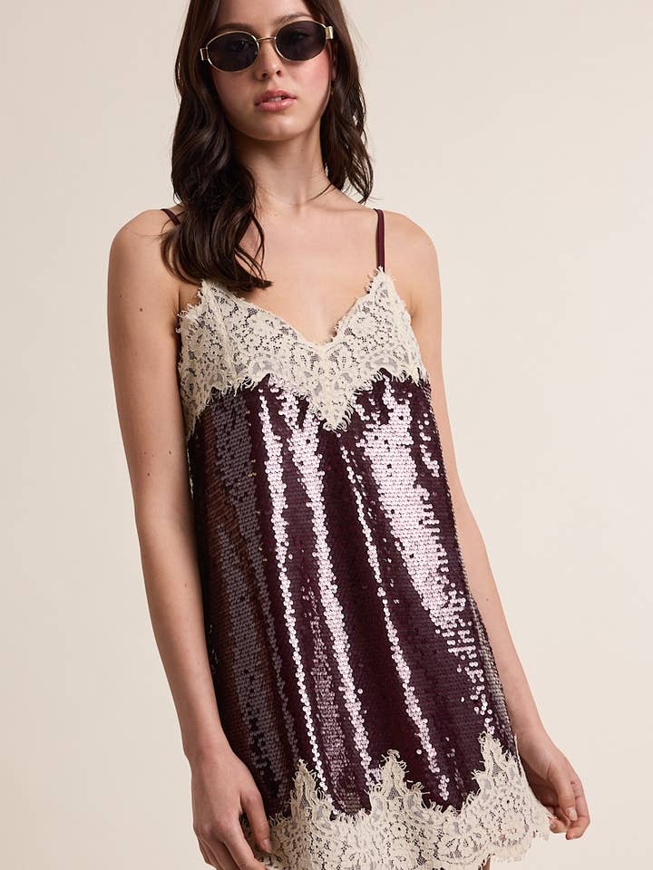 HOLIDAY DARK SEQUIN OFF-WHITE LACE MINI DRESS and other Purchase Wholesale sequin dresses. Free Returns & Net 60 Terms on Faire trending on Faire.