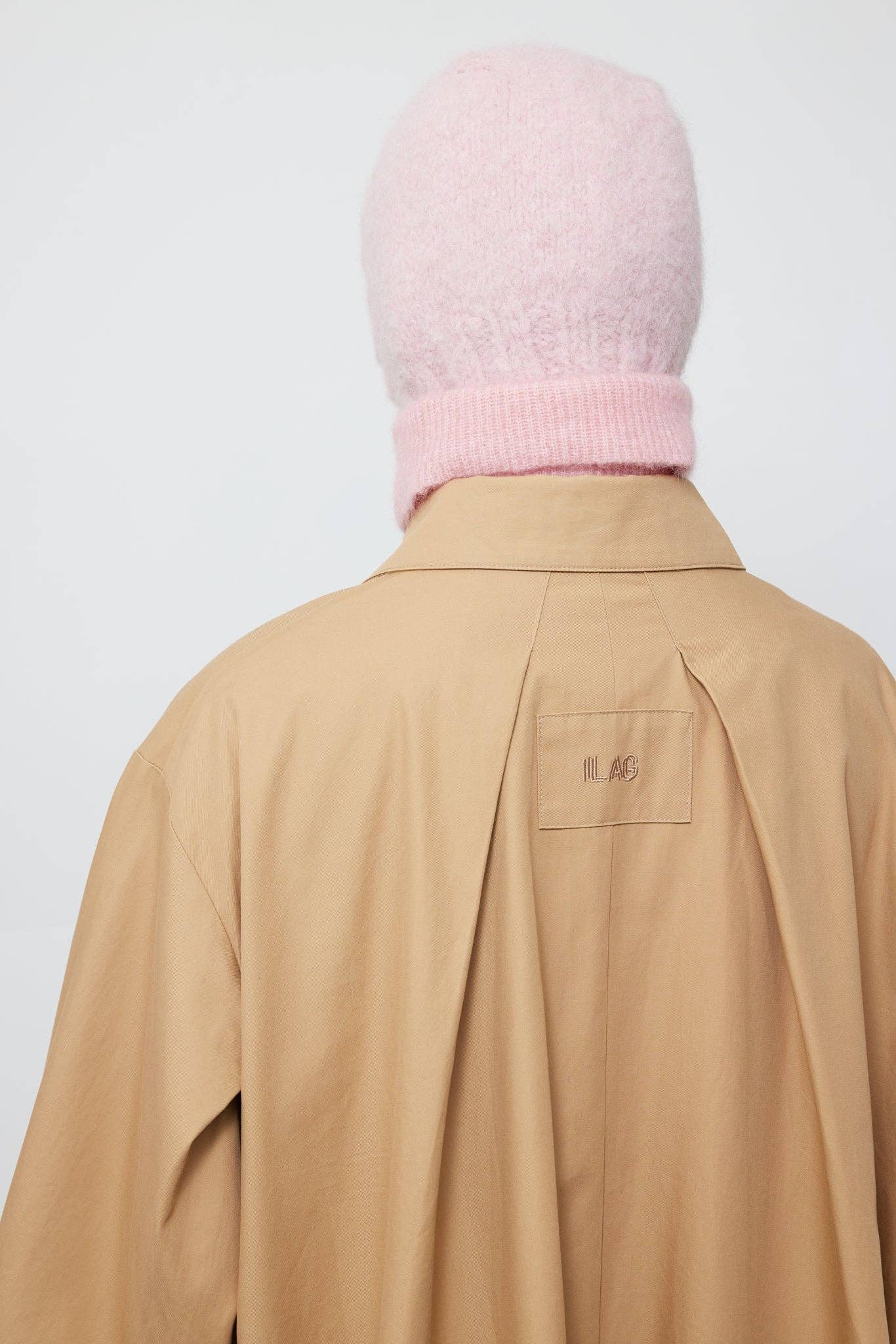 Sand Flekkpetrell mac coat for wholesale on Faire11