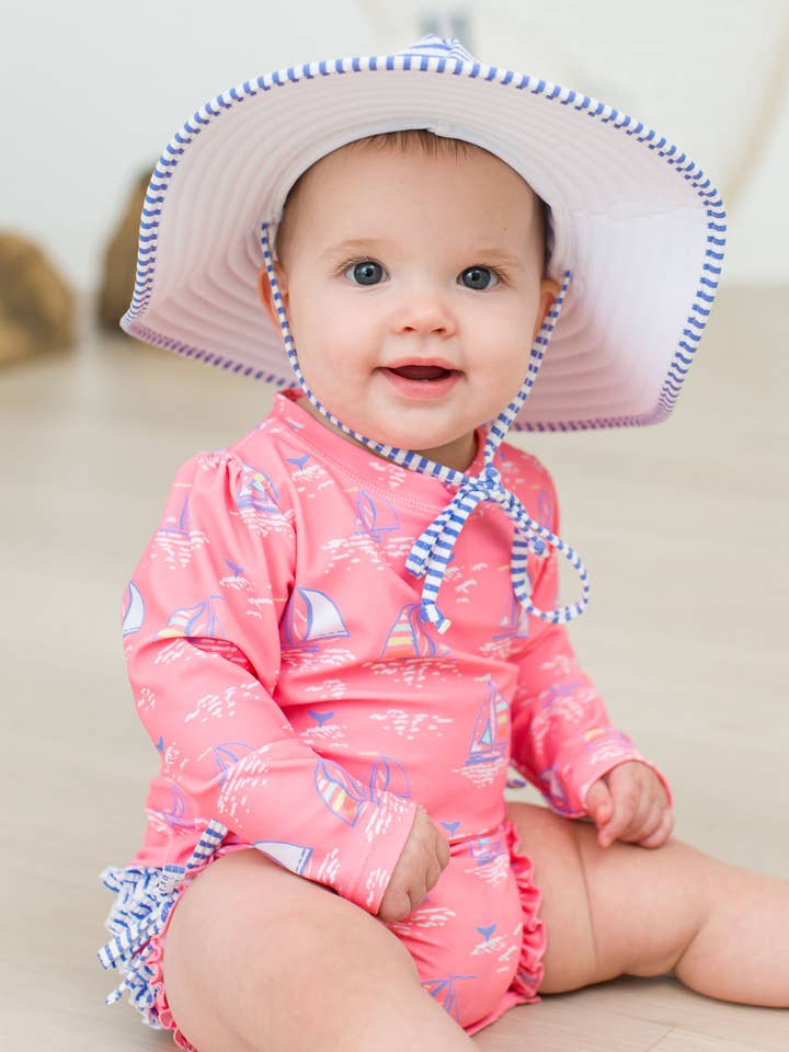 Baby Girls Pink Seas the Day Long Sleeve One Piece Rash Guard Swimsuit with Signature Rear Ruffles
for wholesale on Faire5