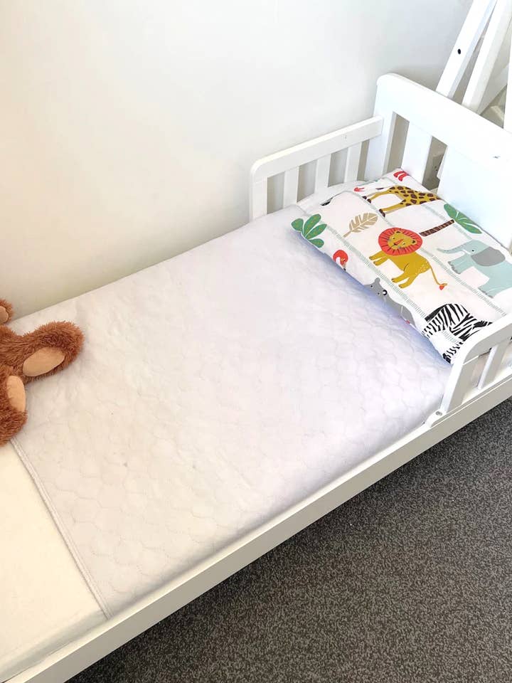 Piddle Pads - Winged bed protectors (Pack of 2) for wholesale by tinkaly