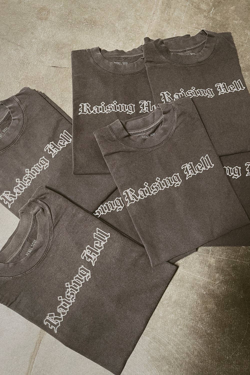 Washed Black Raising Hell Tee for wholesale on Faire4