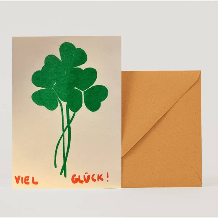 Foldet kort med firkløver og lykønskning for engroshandel hos superjujupress