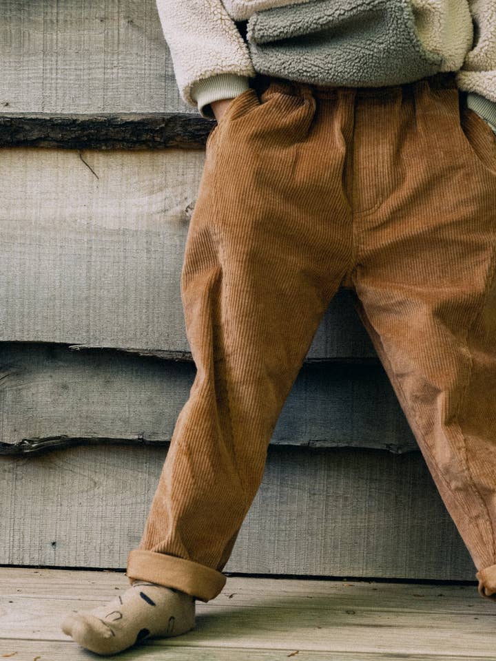 Calças de bombazina orgânica para crianças Terracota por atacado de Tiralahilacha