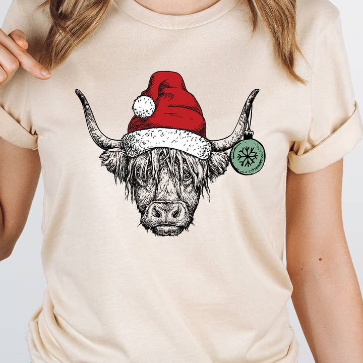 Maglietta grafica natalizia con mucca delle Highlands per la vendita all'ingrosso da parte di Select Apparel