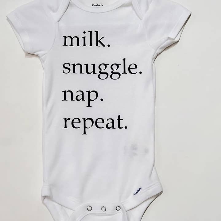 Milk, Snuggle, Nap, Repeat Onesie for wholesale by Driftwood Market Wholesale