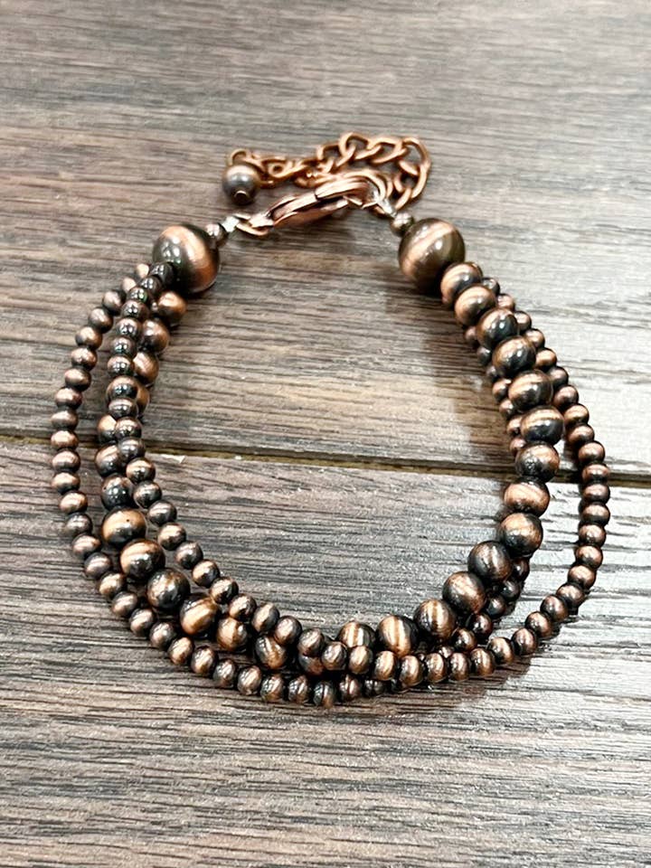 711310, Handmade Copper Navajo Bead Adjustable Bracelet for wholesale by ISAC Trading Inc