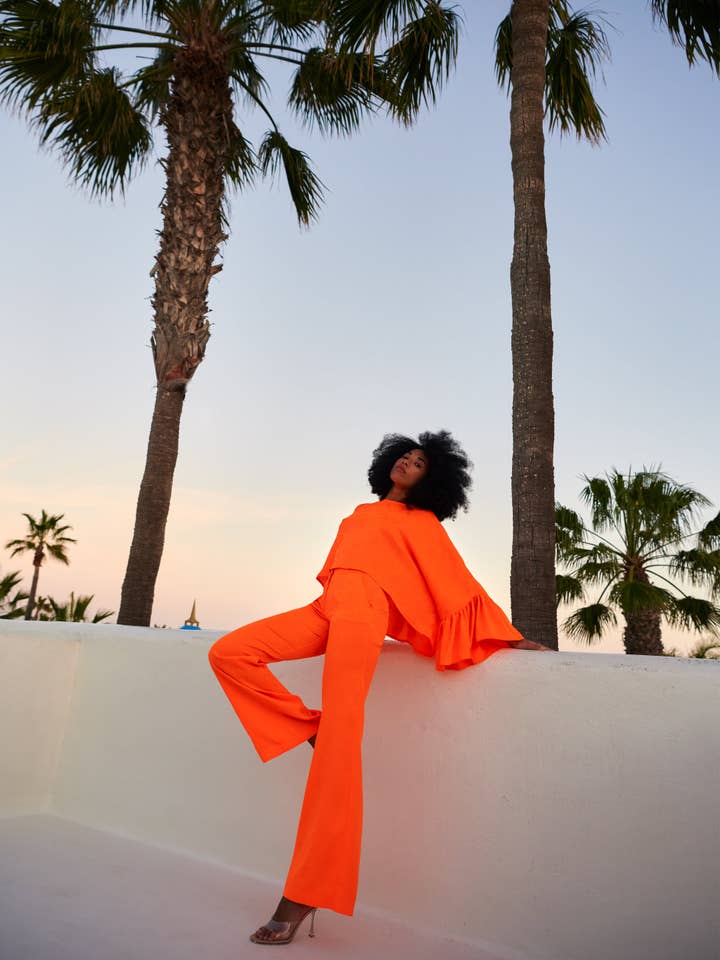 Camicia larga fluorescente Susan arancione per la vendita all'ingrosso da parte di Cyrana