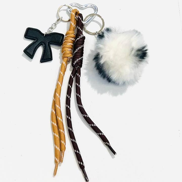 SHEERA - Wholesale Keychain - Women's - White pompom leo novelty keychain1
