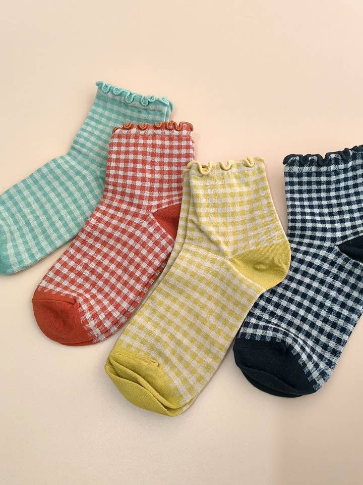 Ruffle Trim Plaid Cotton Ankle Socks for Women_CWMS065 and other Purchase Wholesale cette. Free Returns & Net 60 Terms on Faire trending on Faire.