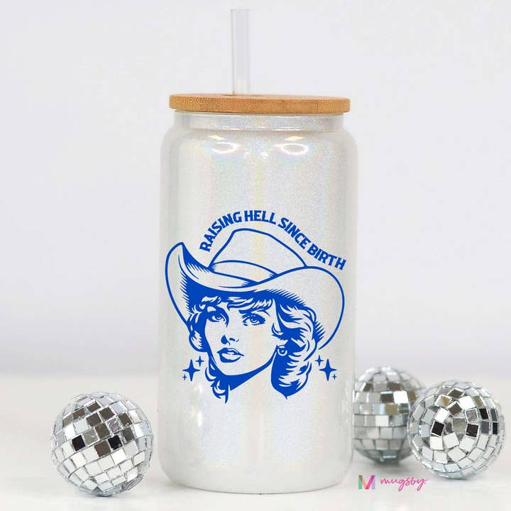 Raising Hell Since Birth Western Glitter Glass Cup for wholesale by Mugsby