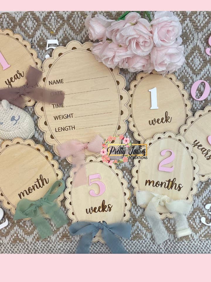 Wooden Ribbon Bow Baby Interchangeable Milestone signs set for wholesale by Pretty Ladies Creations