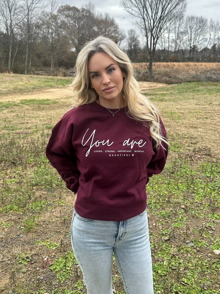 YOU ARE LOVED SWEATSHIRT for wholesale by Adelle Linen