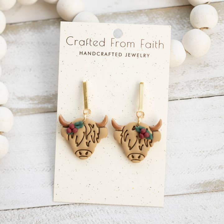 Holly Highland Cow Dangles for wholesale by Crafted From Faith, LLC