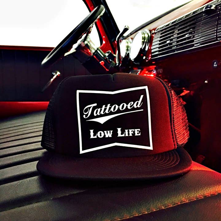 Black White Tattooed Low Life Trucker Hat for wholesale on Faire3