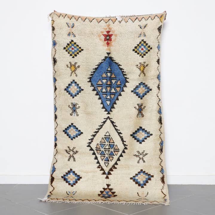 Handmade Moroccan Wool Rug with Blue Diamond Design for wholesale by MUSMUSRUGS