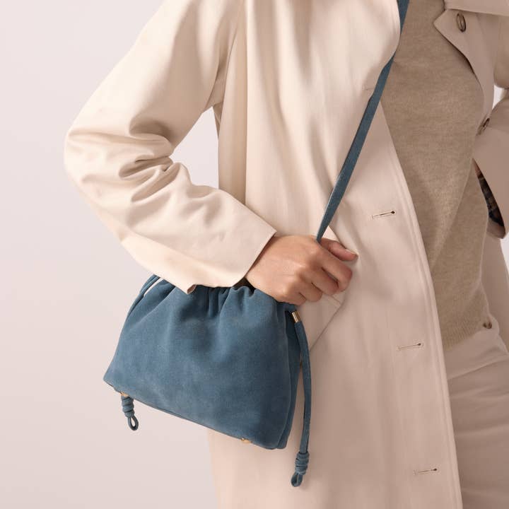 STORM BLUE SUEDE LEATHER BAG TESSA and other Purchase Wholesale cappello a tesa larga. Free Returns & Net 60 Terms on Faire trending on Faire.