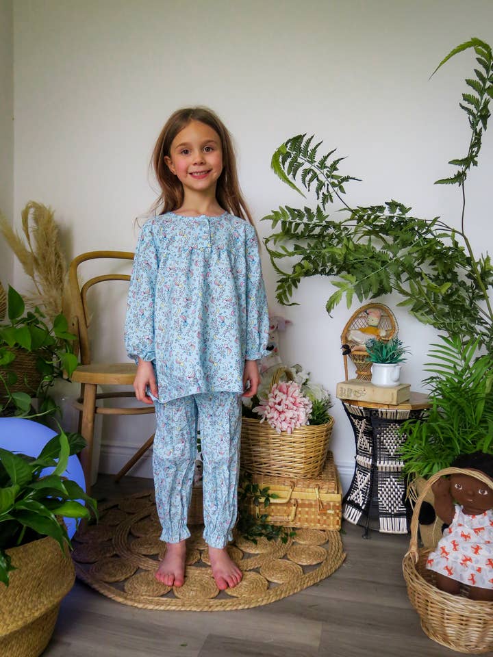 Blue Cosmic Moon & Star children's pyjama set for wholesale by Fox In A Box