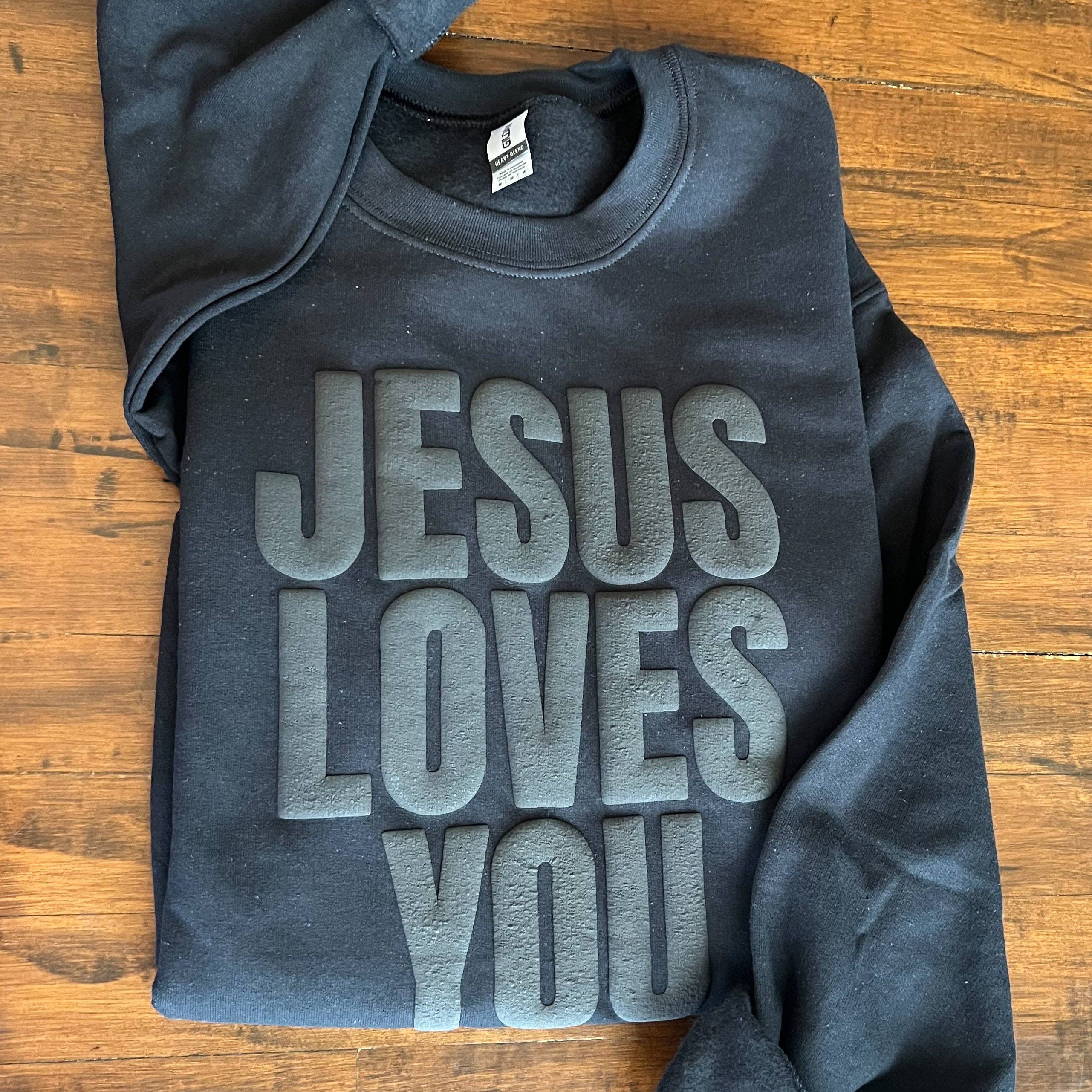 Jesus Loves You Sweatshirt Black on Black Puff for wholesale on Faire1