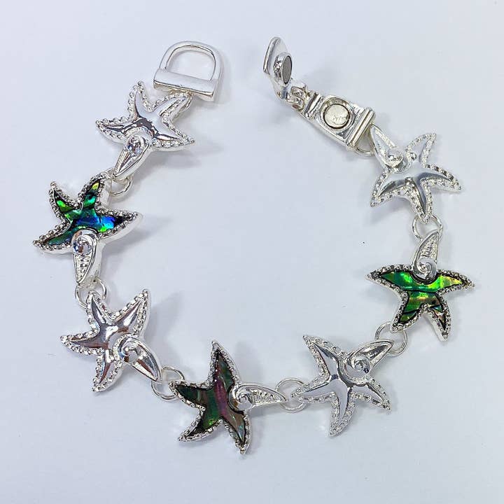 B3037 AB9860 Bracelet en métal connecté en forme d'étoile de mer en nacre. pour la vente par Greater Goods Imports & Wholesale