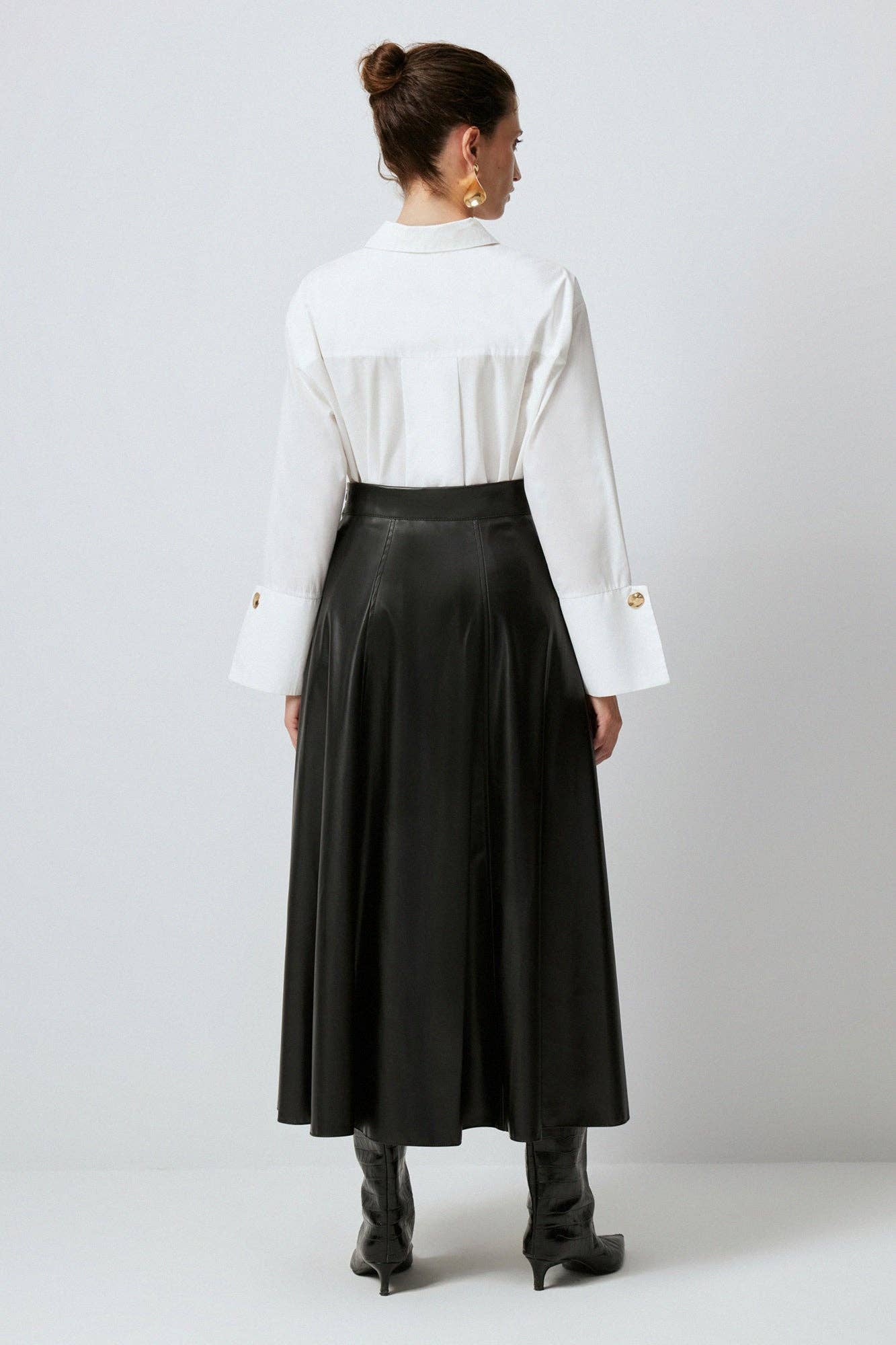 Nero Gonna lunga a trapezio in ecopelle nera con volant in vendita all'ingrosso su Faire2