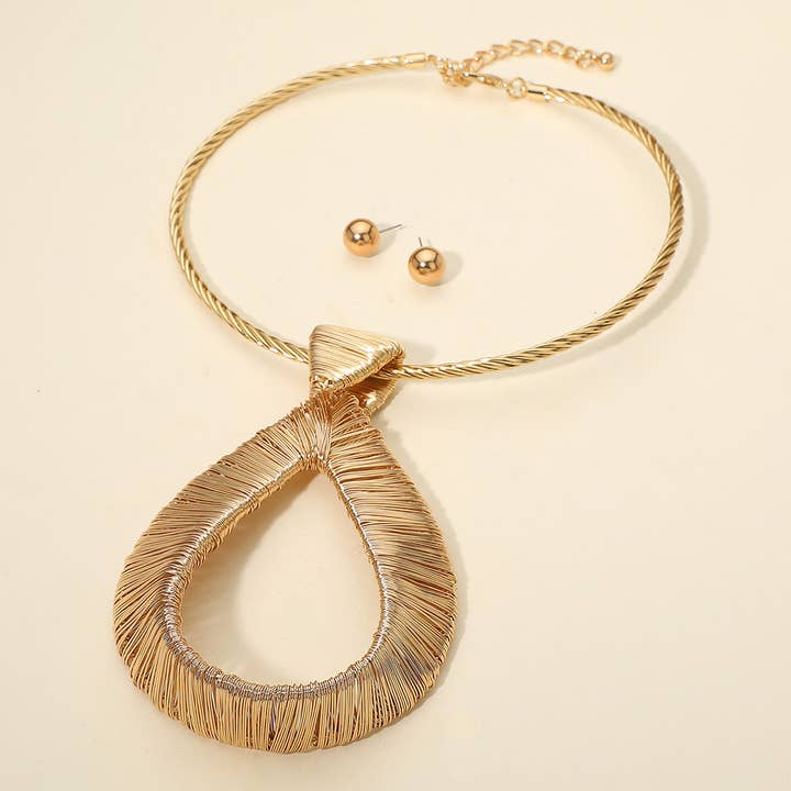 Bold Metal Wire Wrapped Teardrop Pendant Statement Necklace for wholesale by Sensibling Corp.