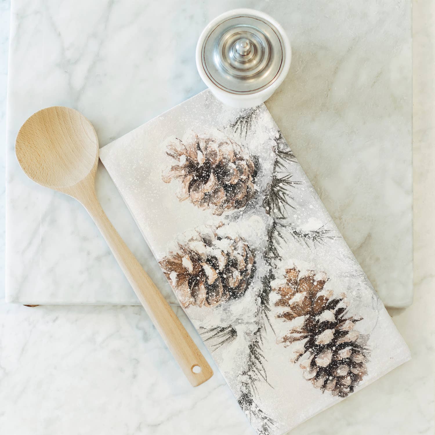 White Winter Pinecone Tea Towel for wholesale on Faire1