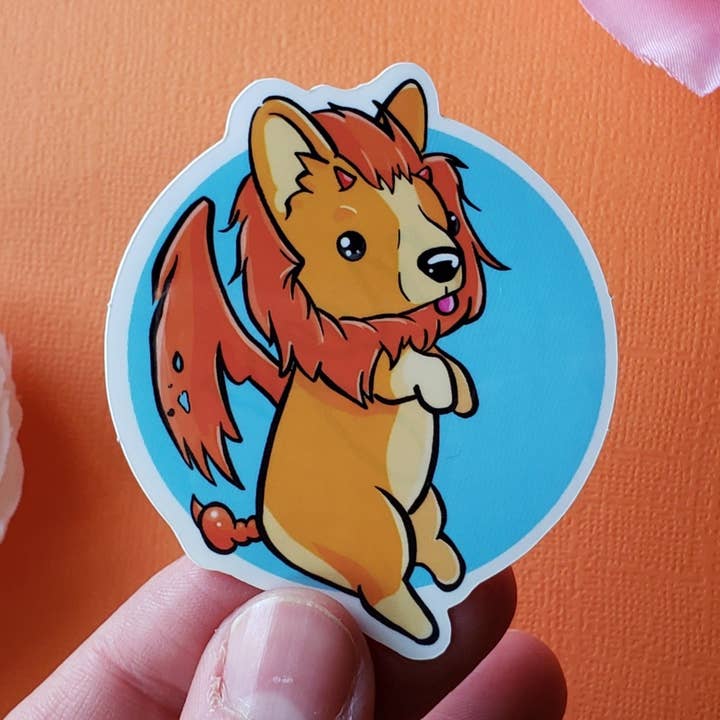 Manticorgi Sticker (manticore + corgi) for wholesale by Meg's Mashables