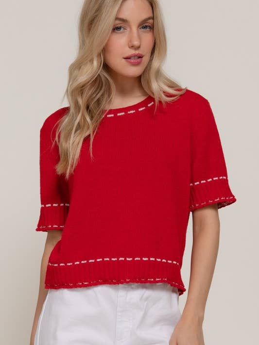 Pull court à manches longues avec coutures contrastées pour la vente par Lemon Tree