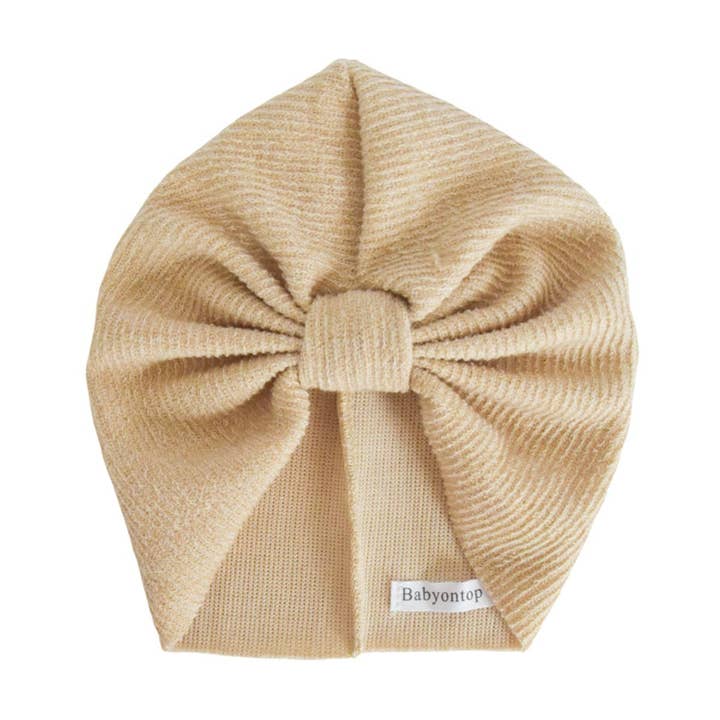Turban ROSA in warme zandkleurige stof voor wholesale door BABYONTOP