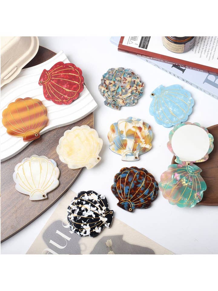 Mirroray - Seashell-shaped Acetate Mirror for wholesale by WEST AUSSIE SUPPLIES