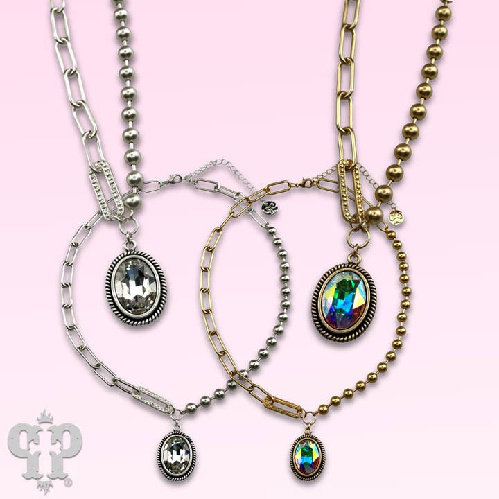 Vertical oval crystal pendant on mixed chain necklace for wholesale by Pink Panache Brands
