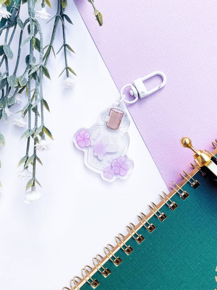 Ciondolo in acrilico a forma di fata in bottiglia | Zelda Floral Keychain per la vendita all'ingrosso da parte di Sarah May Arts