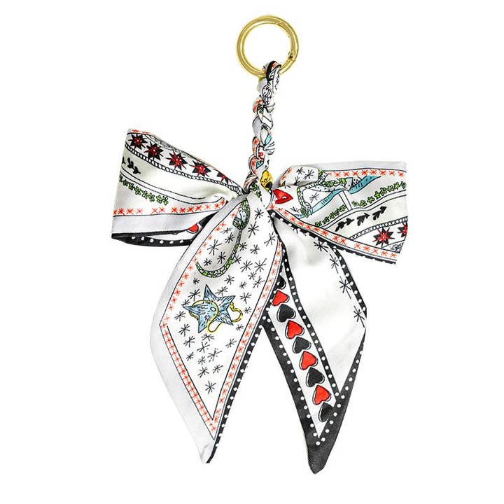 AMORINO SRL – wholesale Nyckelringar - Dam – CHARM VÄSKA NYCKELRING BAND MED ROSETT - MY2444B518